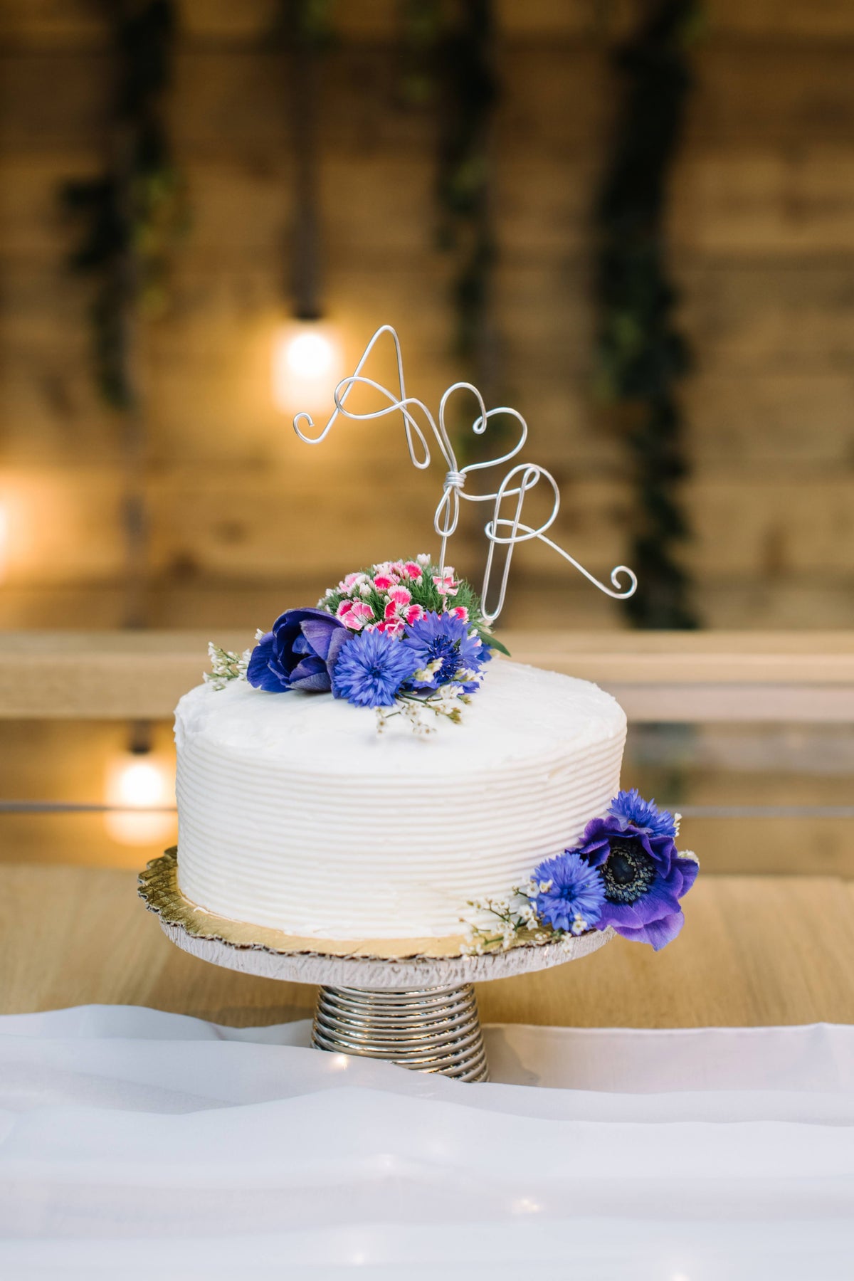 Wildflower - Lily on the Thames - DIY Wedding Flowers - Have your guests think you spent the morning in a meadow picking your cheery, airy flowers! It should be noted, the flowers will not be picked in a meadow, they will be commercial florist grade bloom